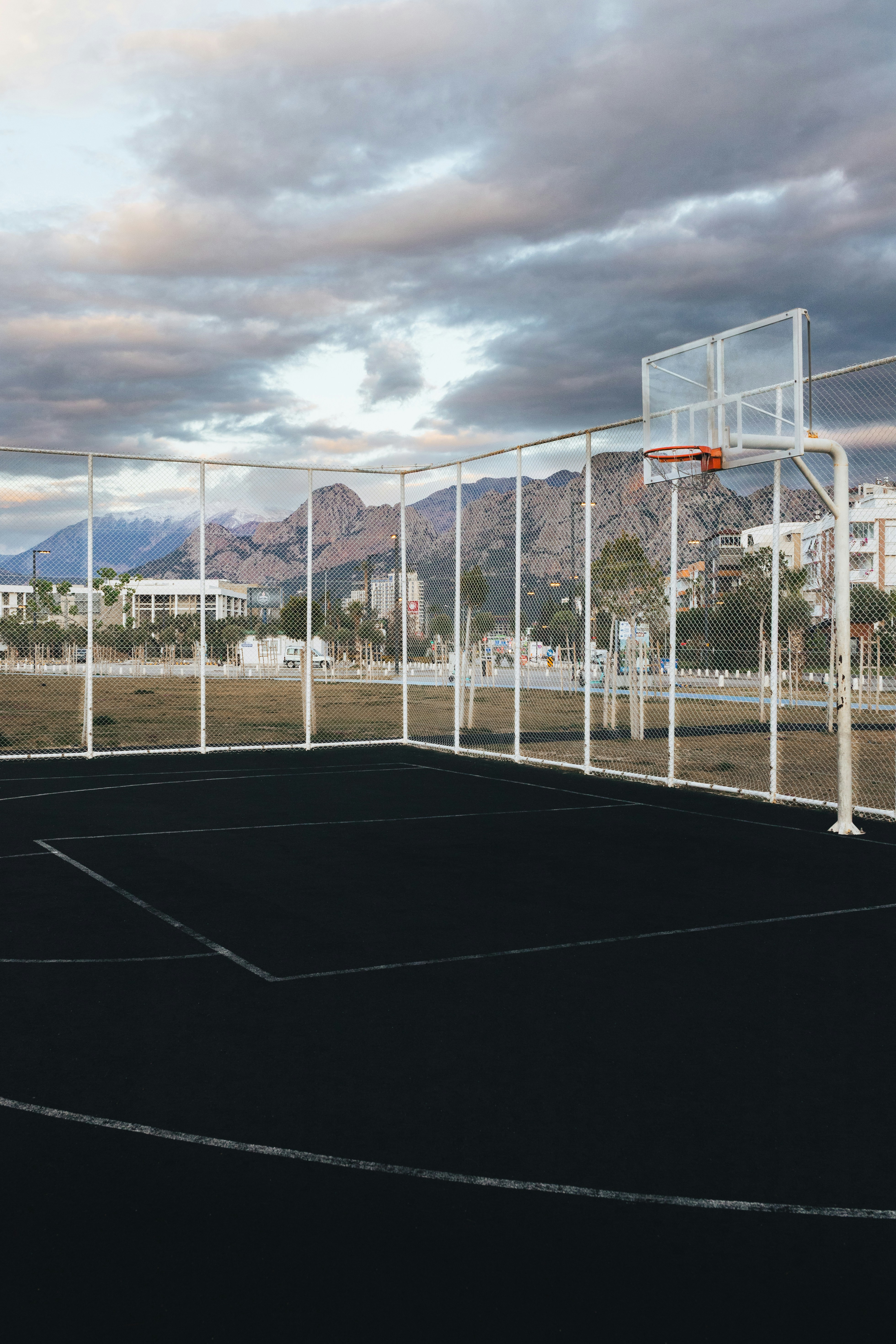 Customizing an outdoor basketball court with lighting and seating