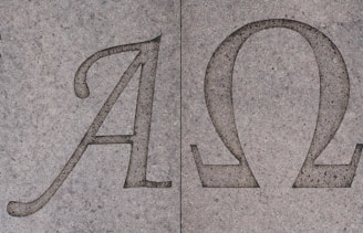 Alpha and omega symbols are shown.