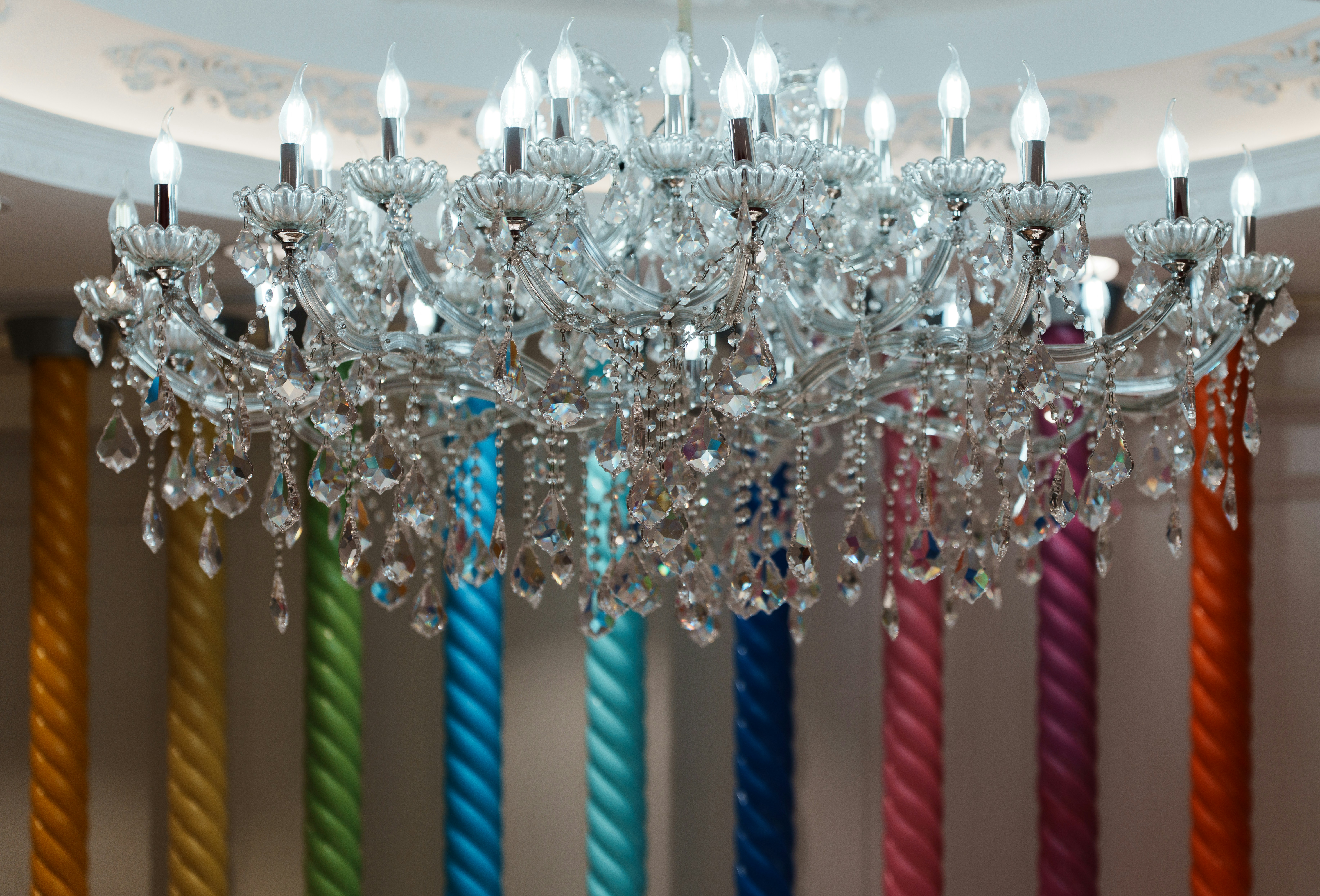 Crystal lamp and colorful columns background