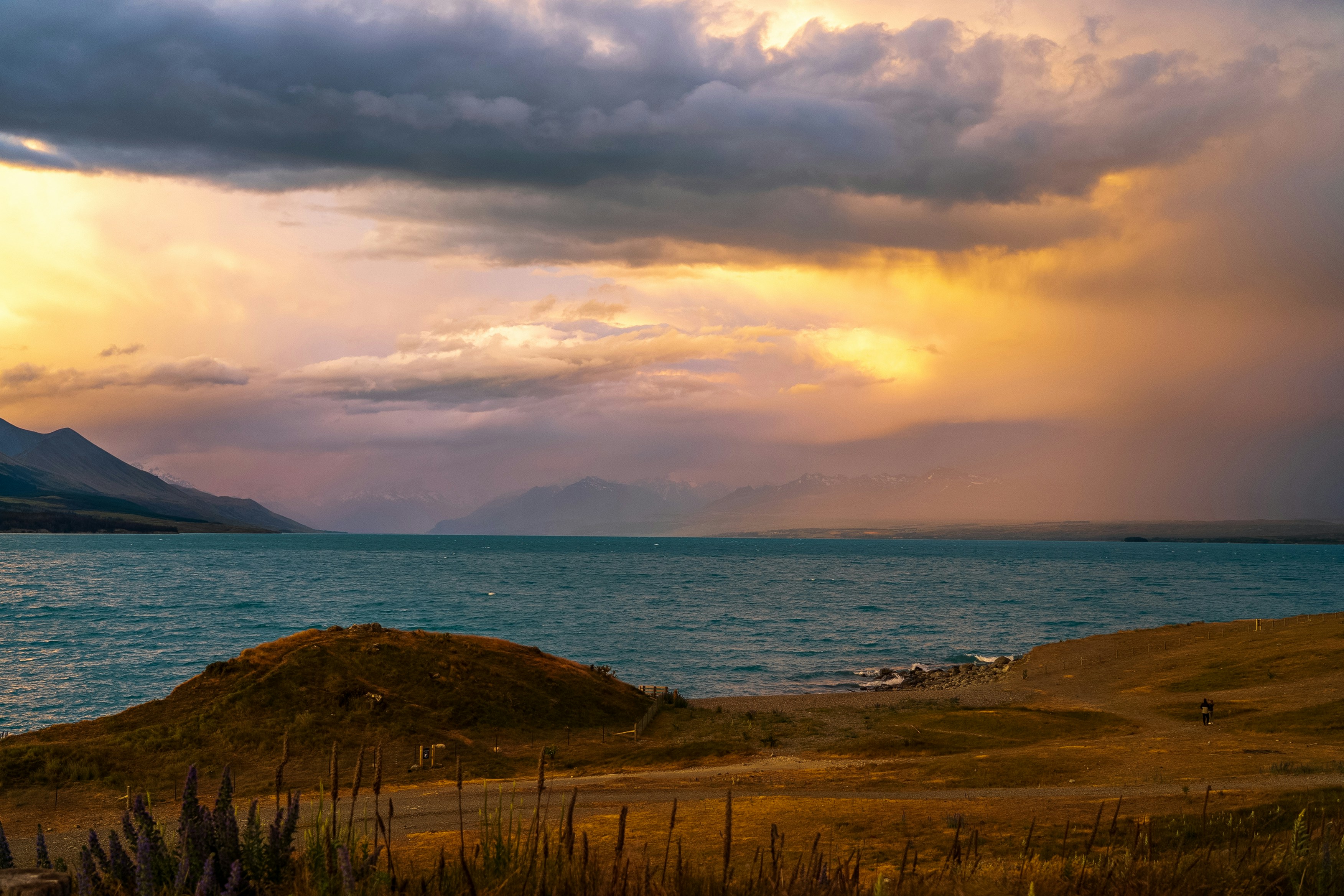 Dramatic sky over a lake at sunset.