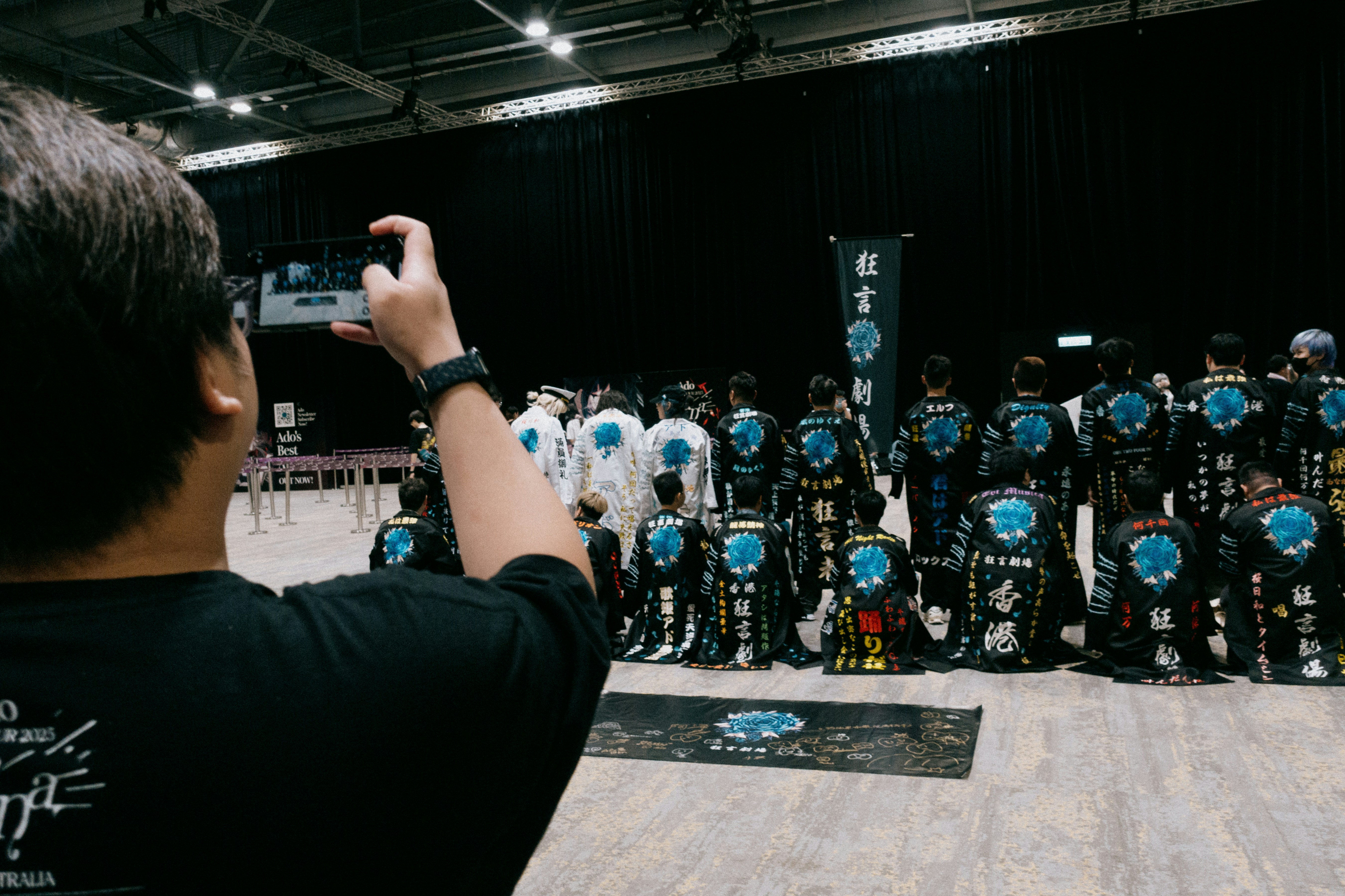 Someone is taking a photo of a group of people.