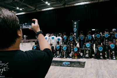 Someone is taking a photo of a group of people.