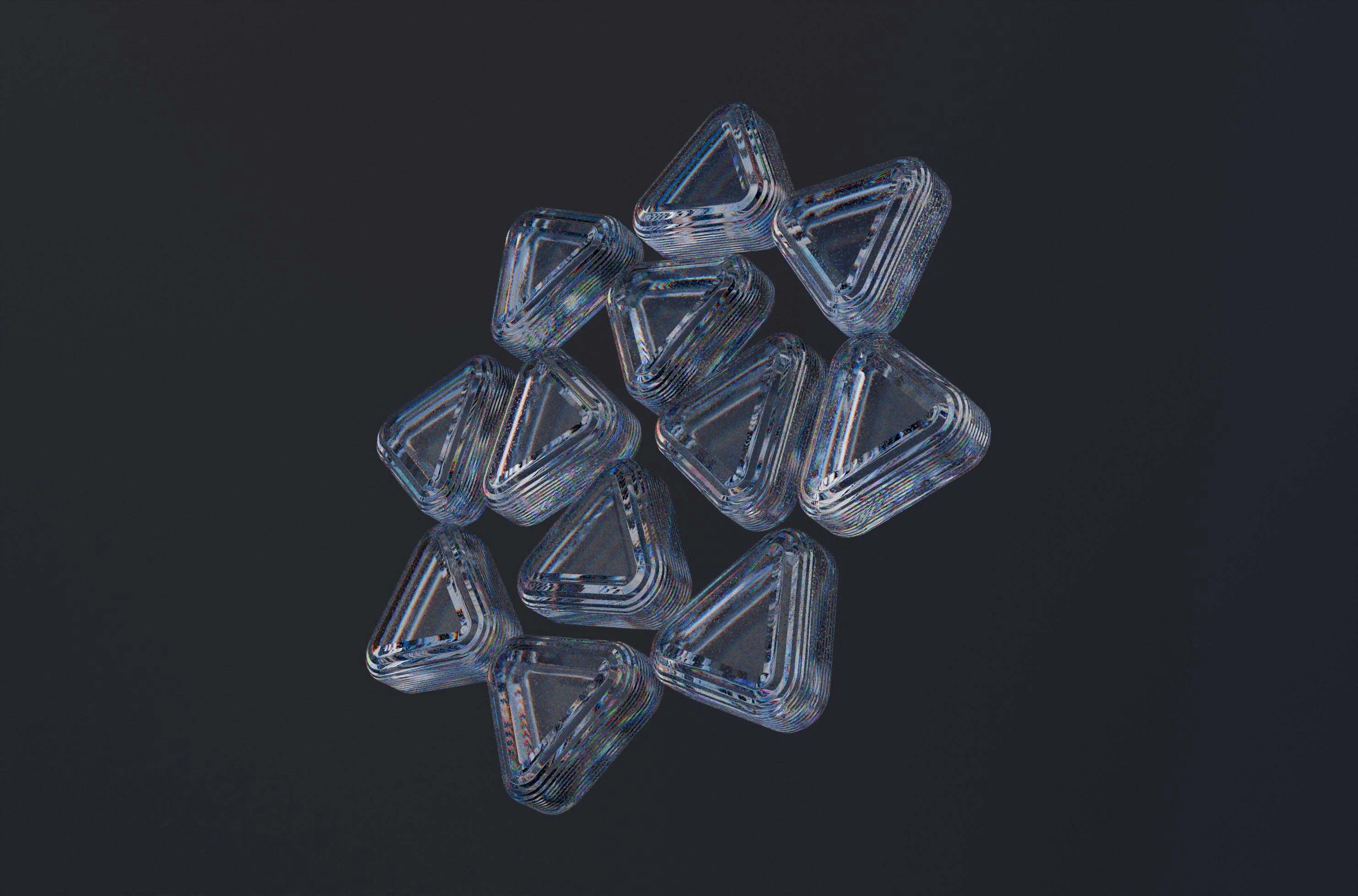Triangular, translucent objects are clustered together.