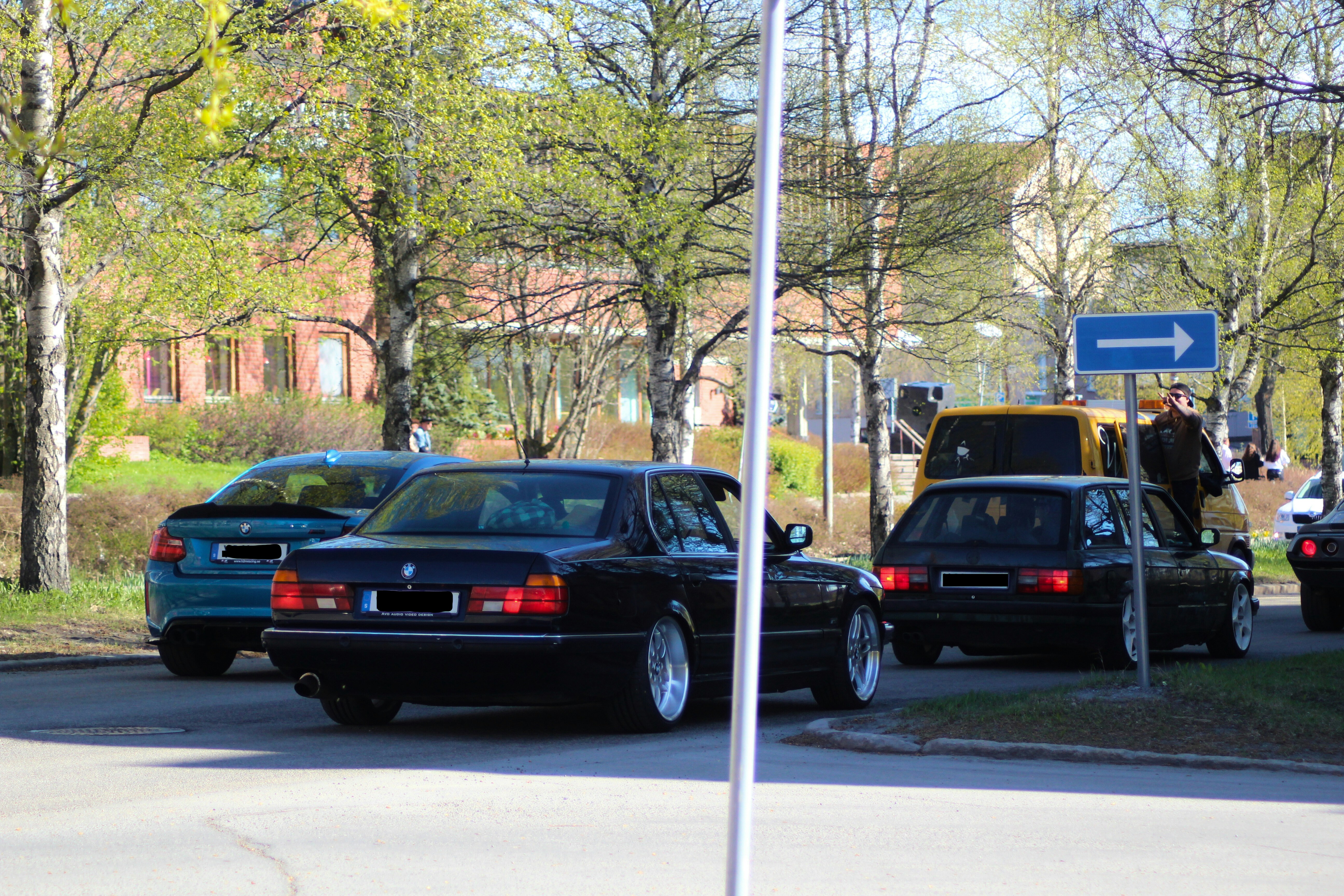 Cars are parked in a parking area.