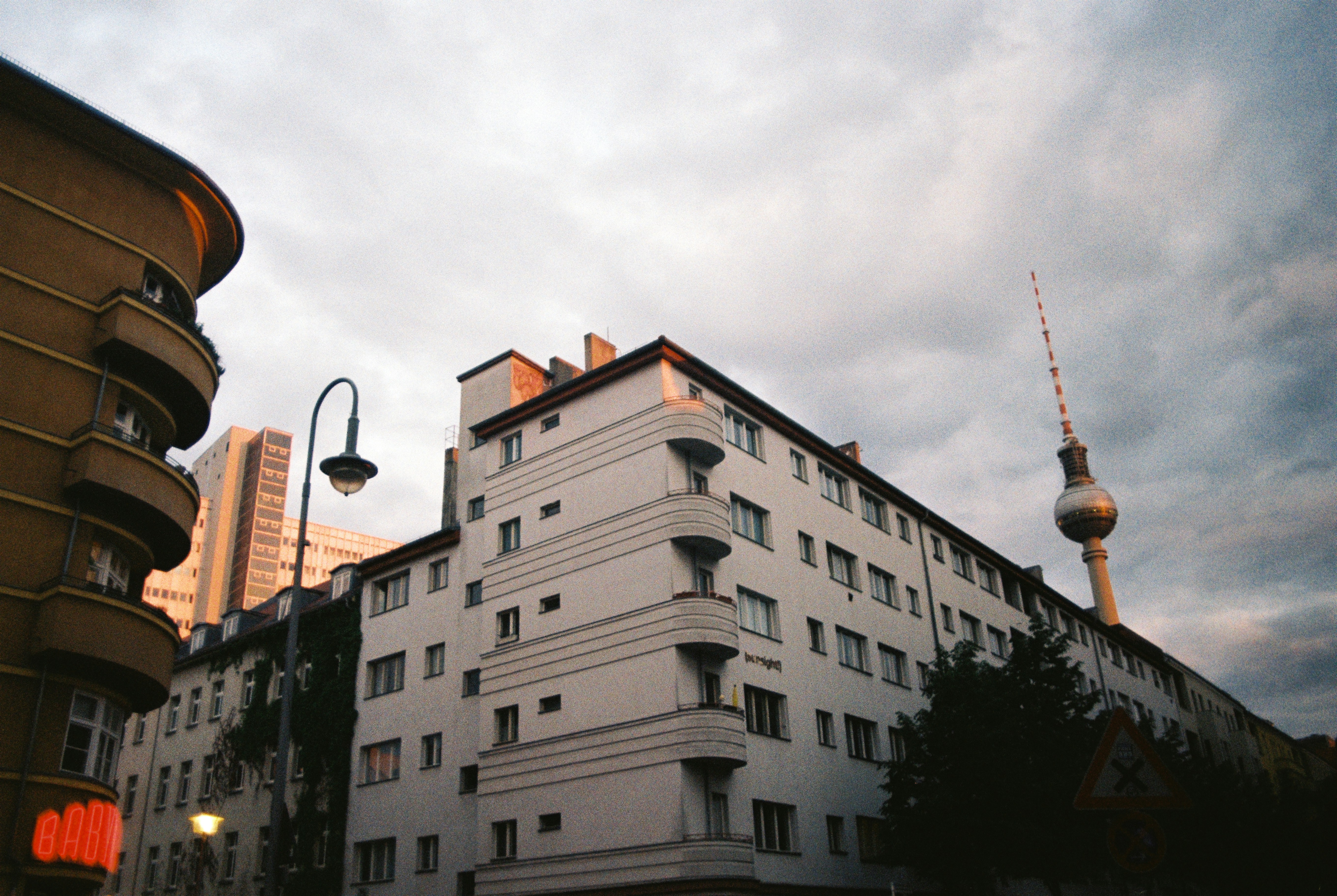 Buildings in berlin with the fernsehturm in sight.