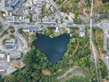 An aerial view shows a heart-shaped lake.