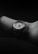 A watch is on a person's wrist.