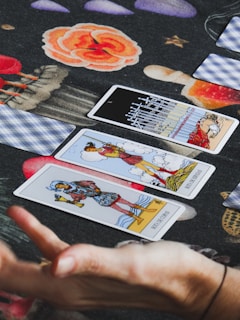 Tarot cards are laid out on a table.