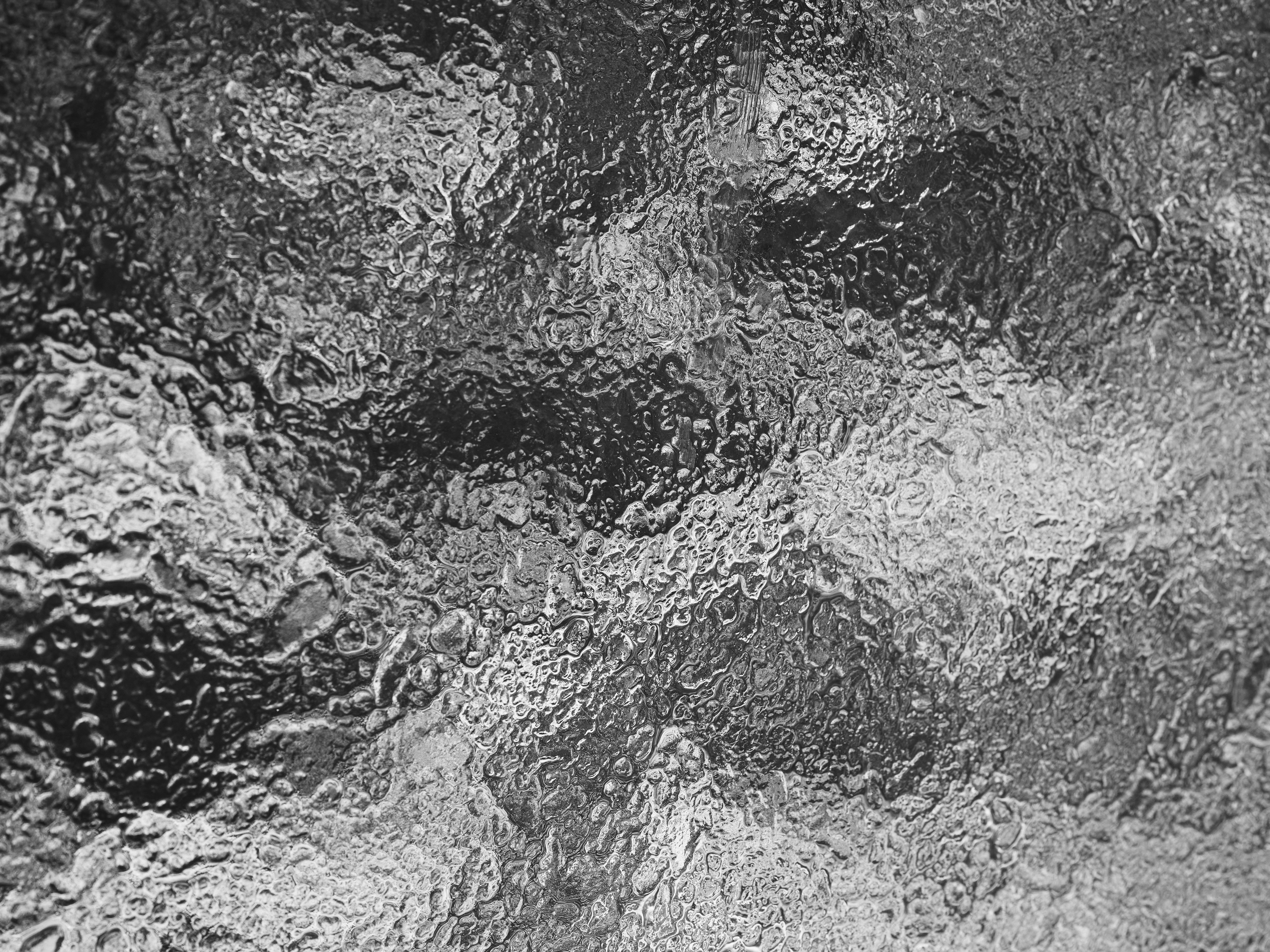 Frosted glass texture, evoking a sense of smoothness.