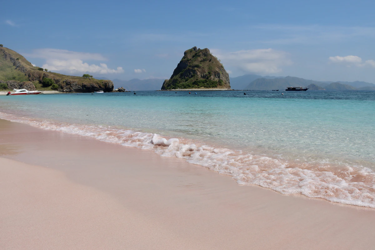 Pink Beach with pale pink sand and turquoise water in the Komodo region