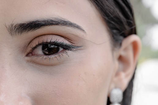 Eye and part of a face with elegant makeup.