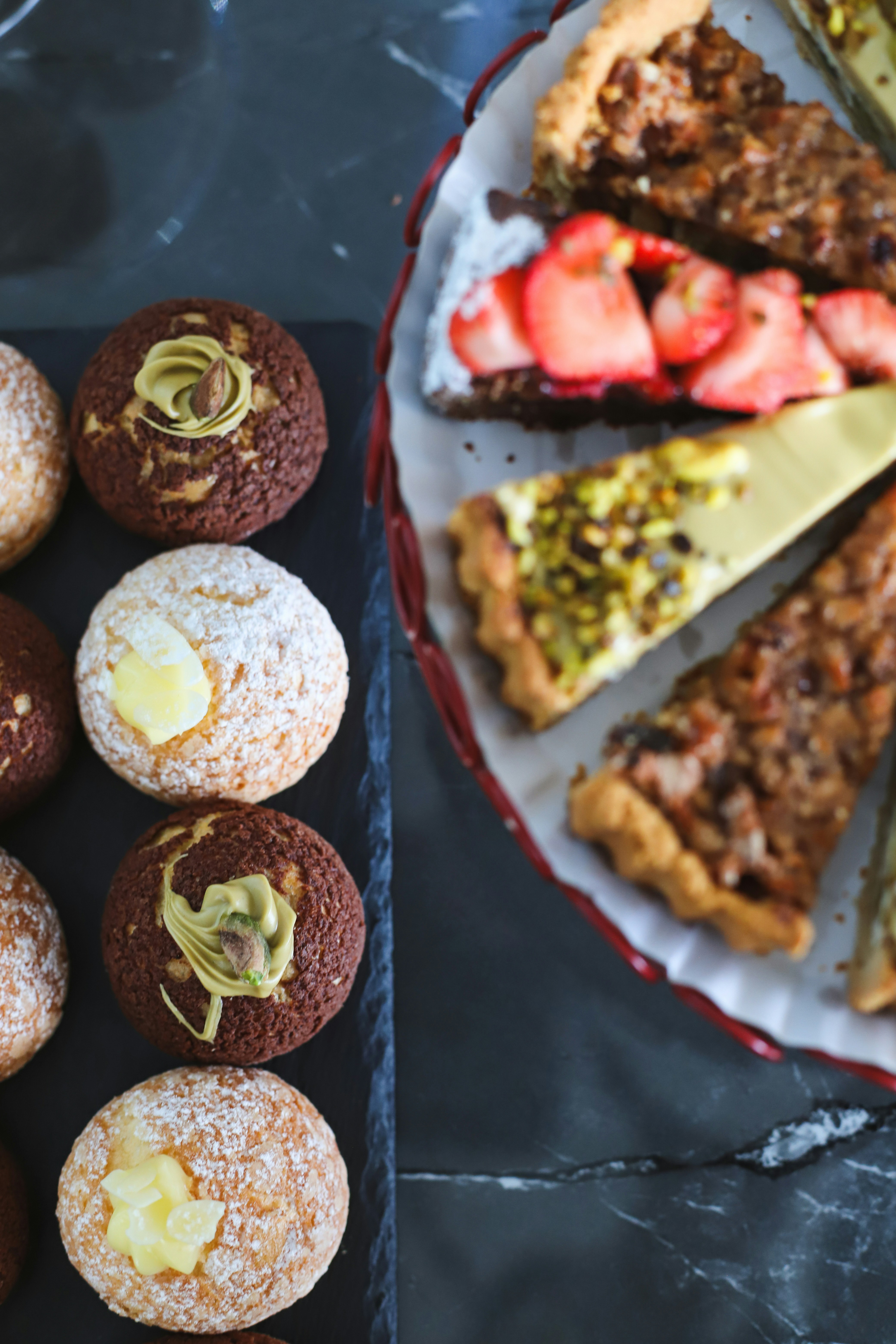 Delicious pastries and tarts are displayed beautifully.