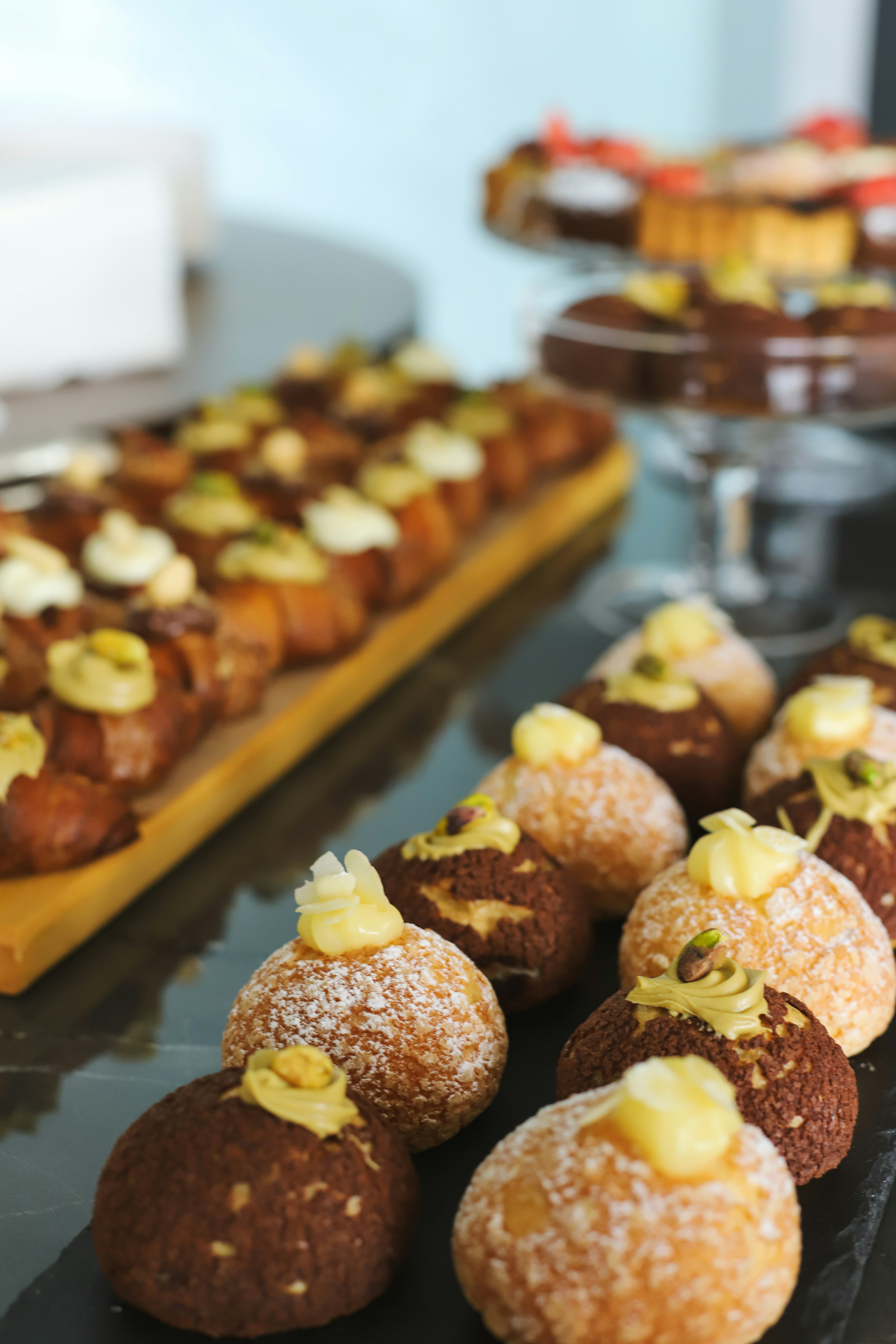 Delicious pastries are displayed beautifully on a table.