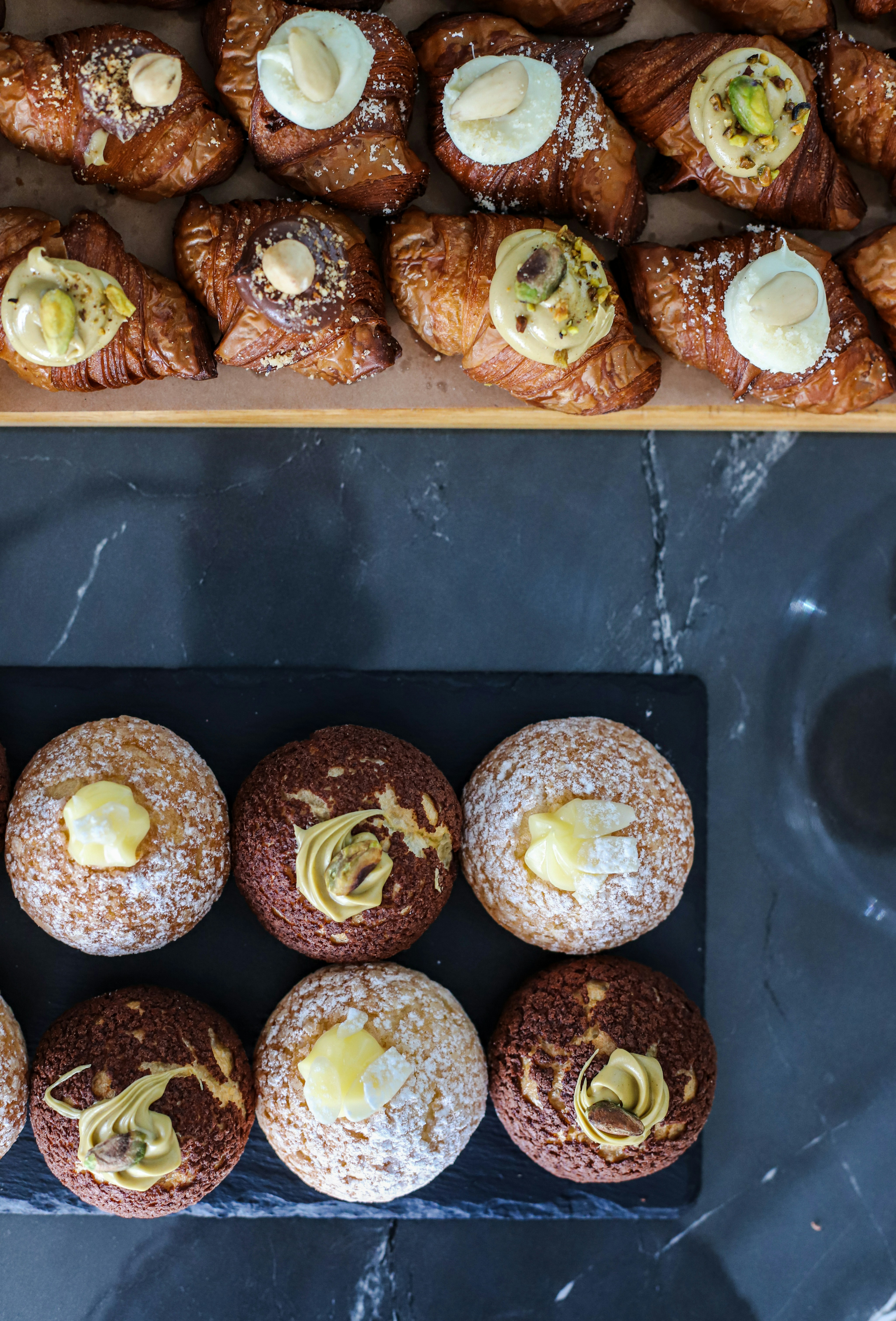 Delicious pastries and treats are arranged for display.