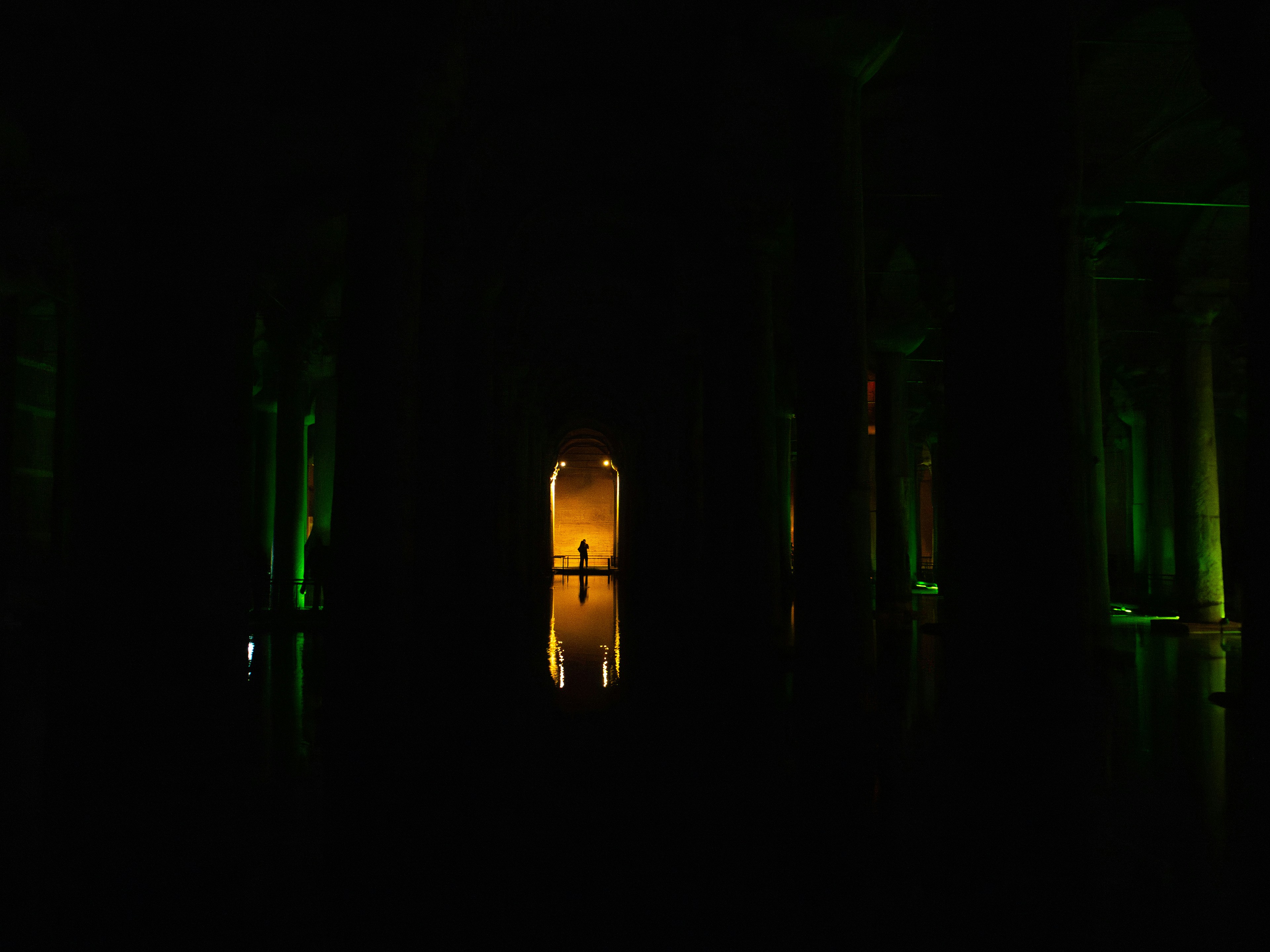 Dark hallway with candlelight