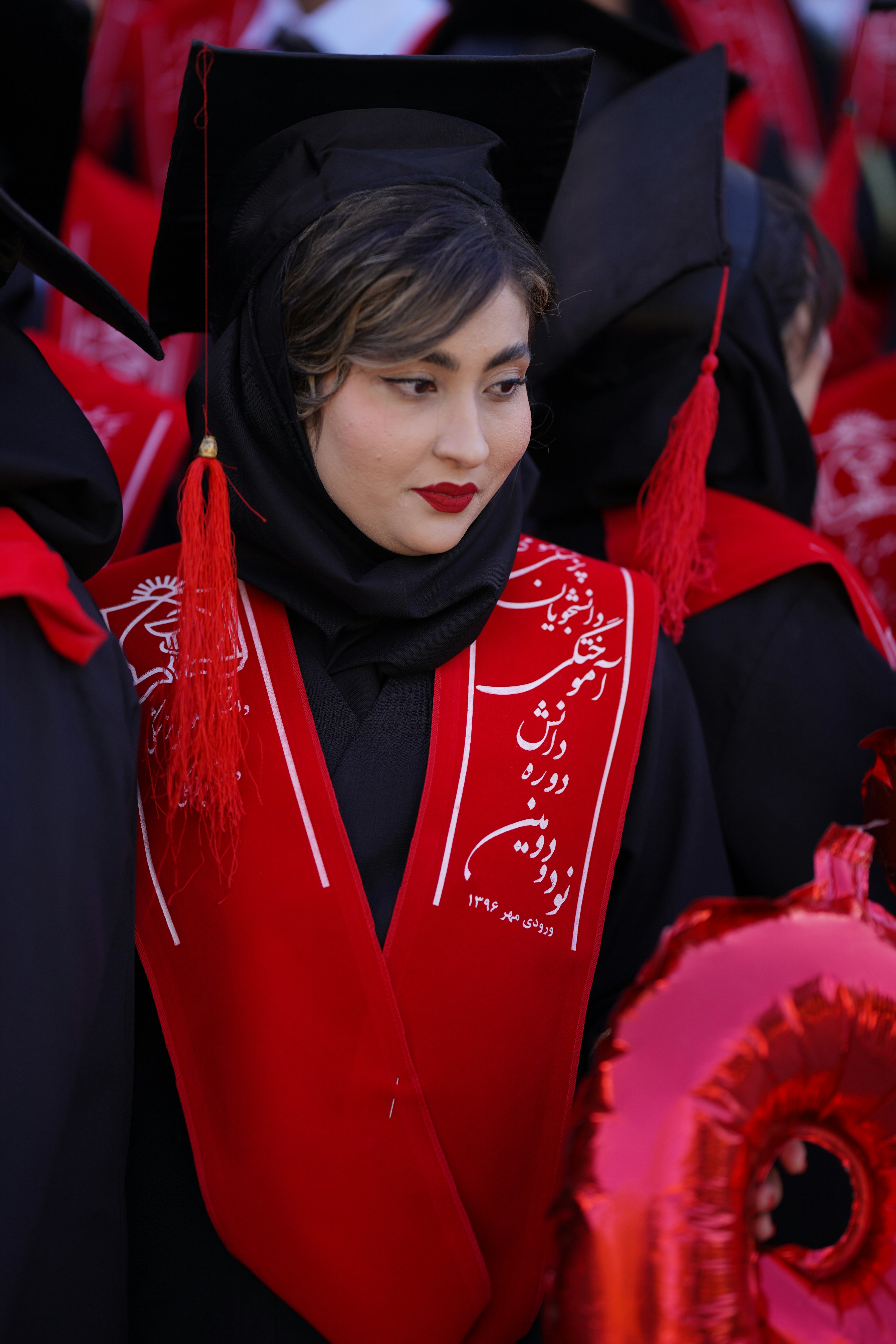 A woman is celebrating her graduation day.