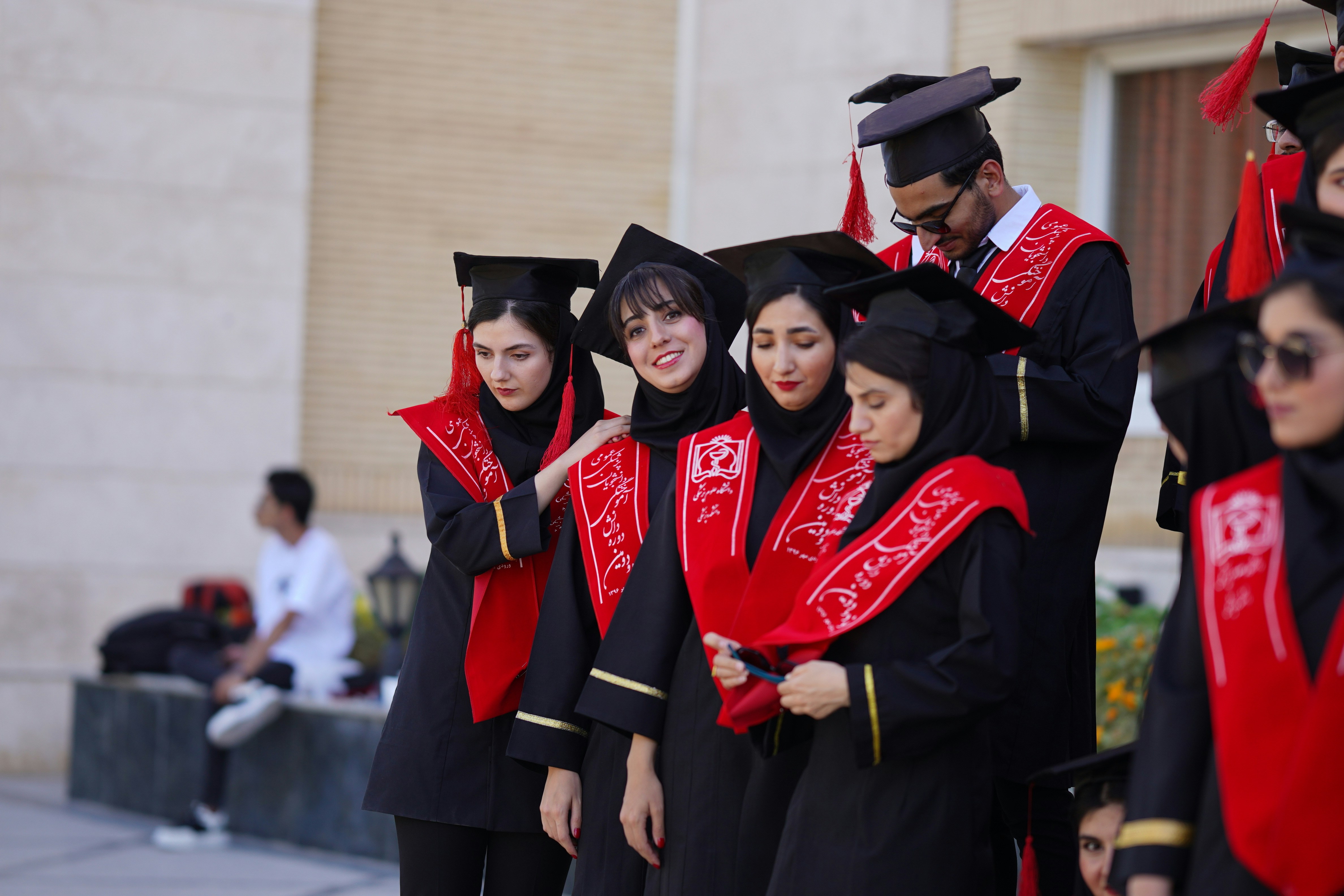 Graduates in gowns and stoles