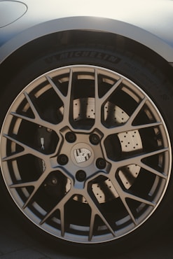A detailed shot of a porsche wheel.