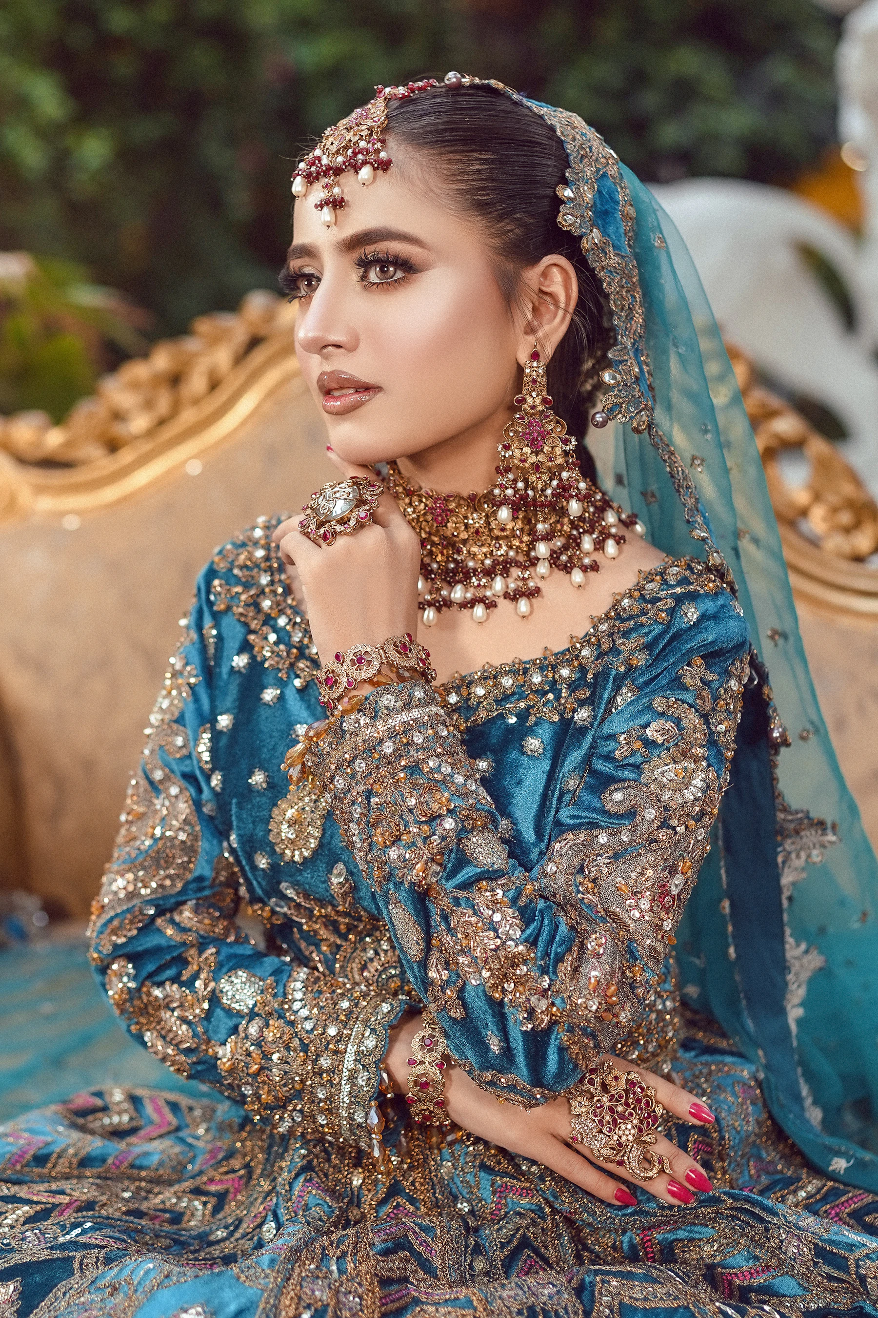 Bride in an elaborate embroidered outfit