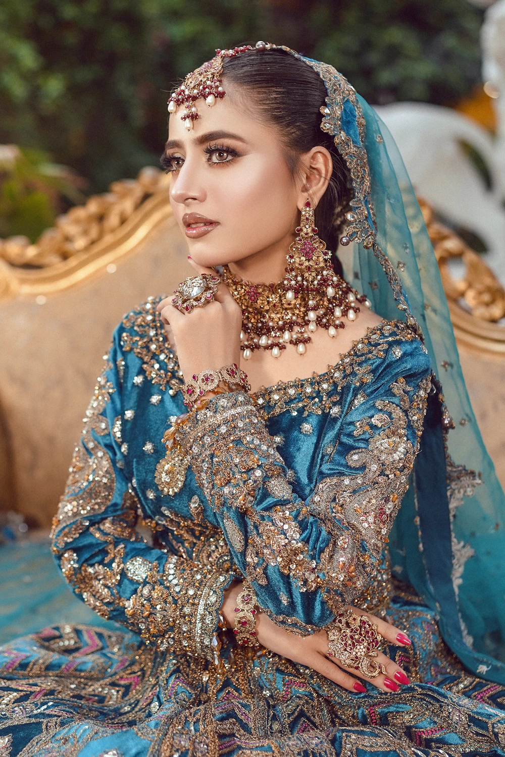 A bride in an elaborate outfit