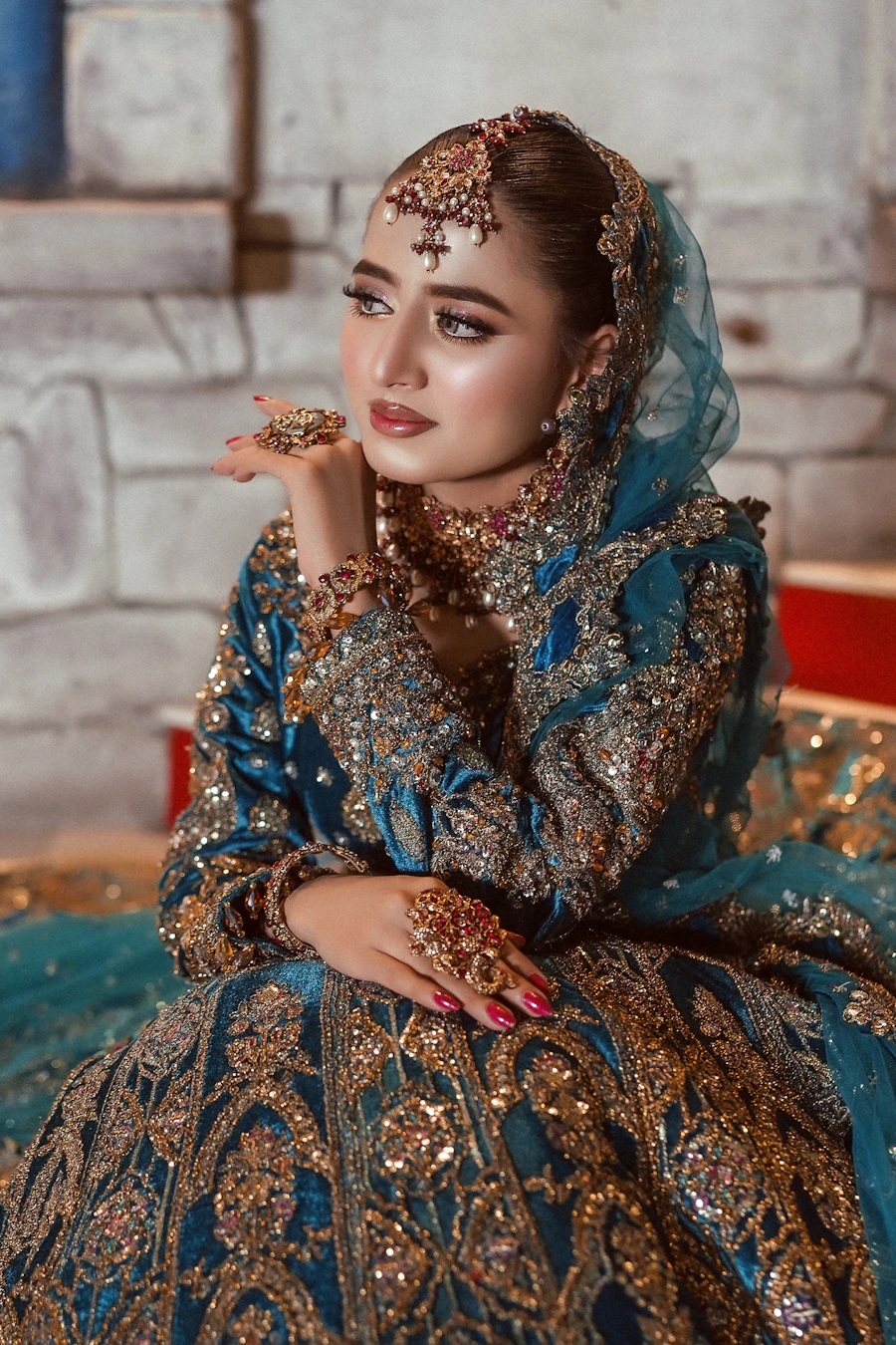 Woman in elaborate embroidered occasion attire