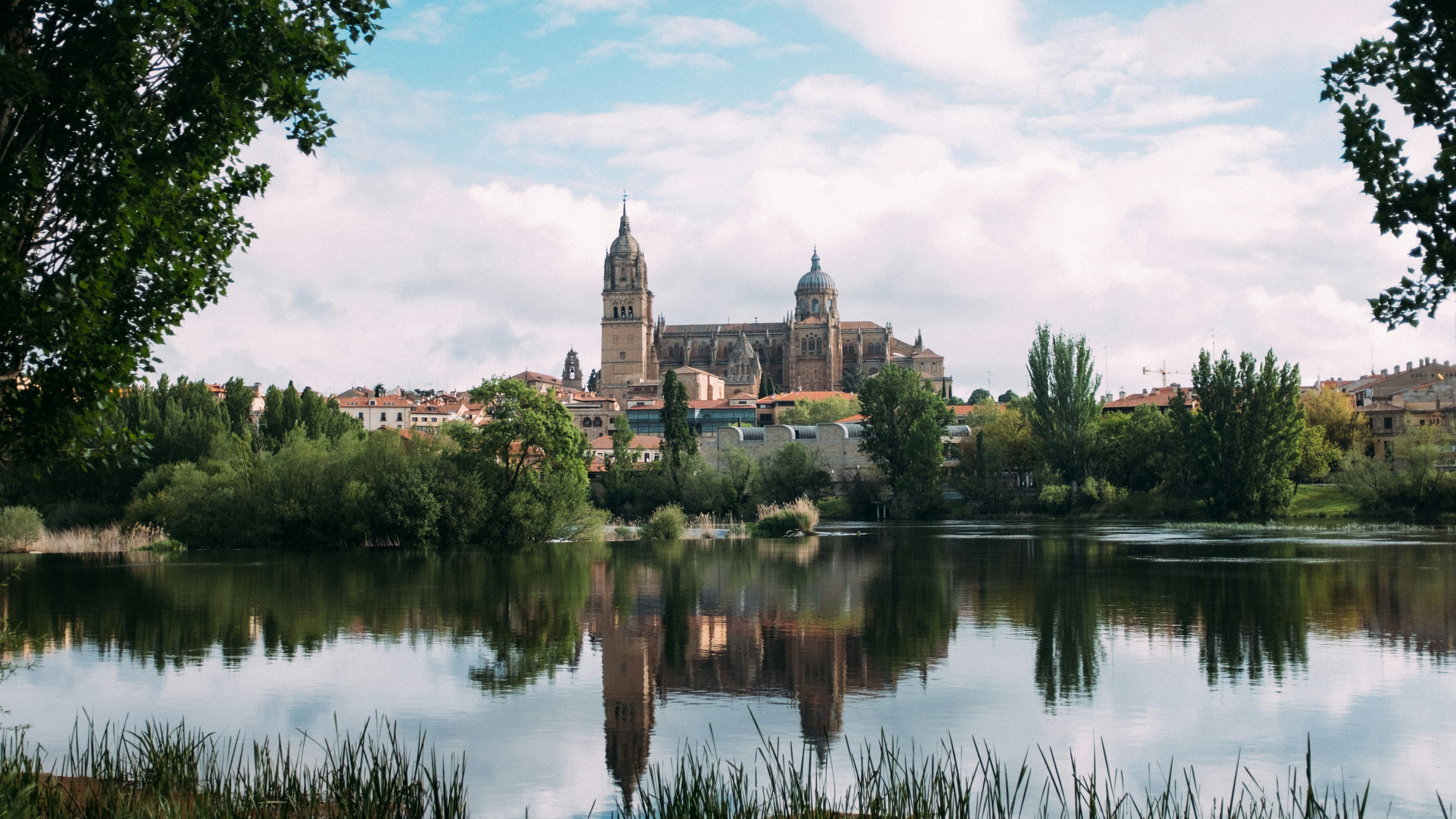 A majestic cathedral reflected in tranquil water.