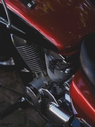 A close-up of a red motorcycle.