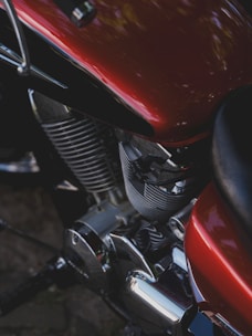 A close-up of a red motorcycle.