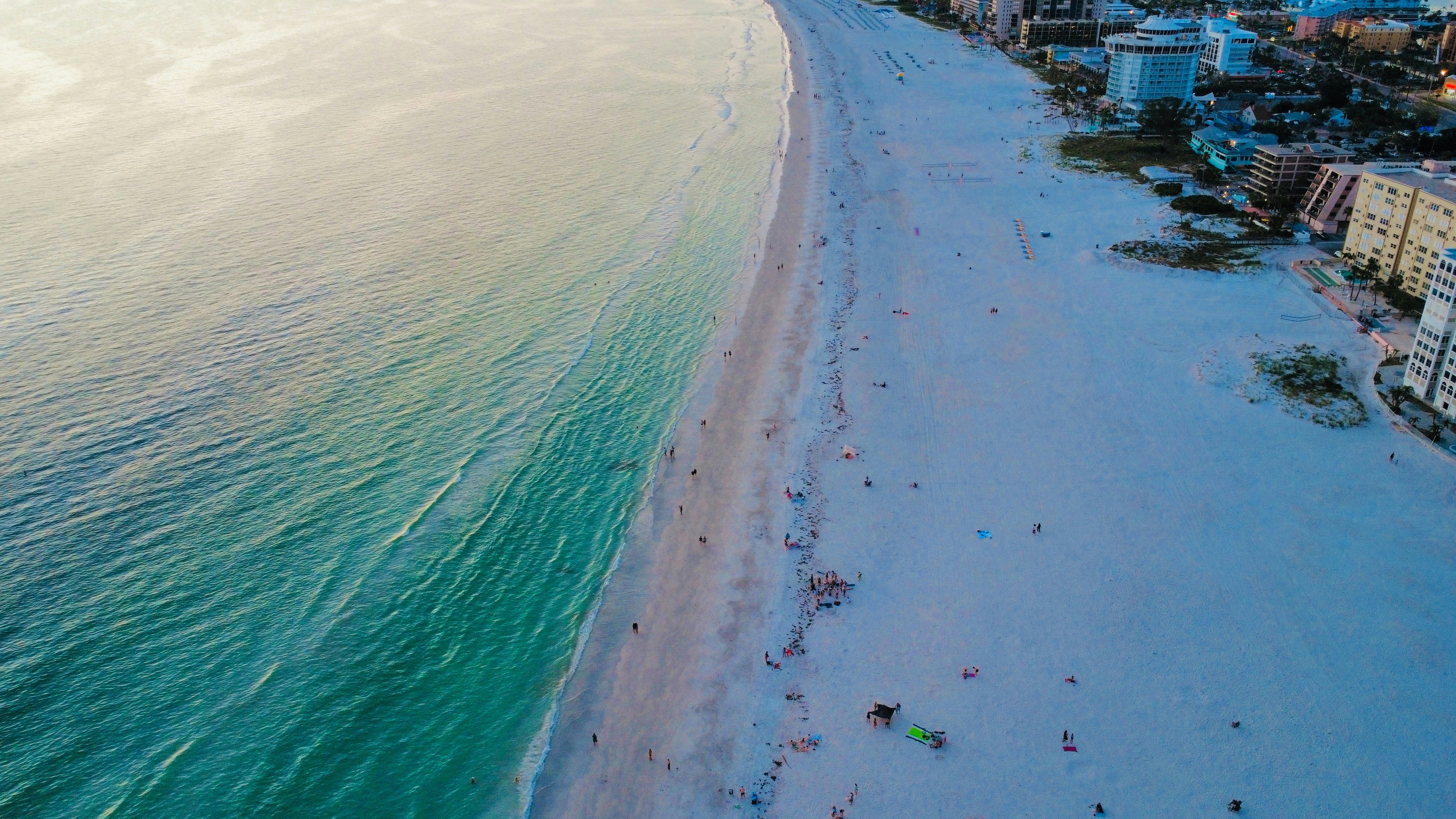 Aerial view of a stunning beach and buildings