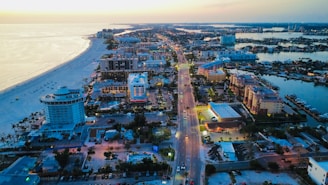 Aerial view of a coastal town at dusk.