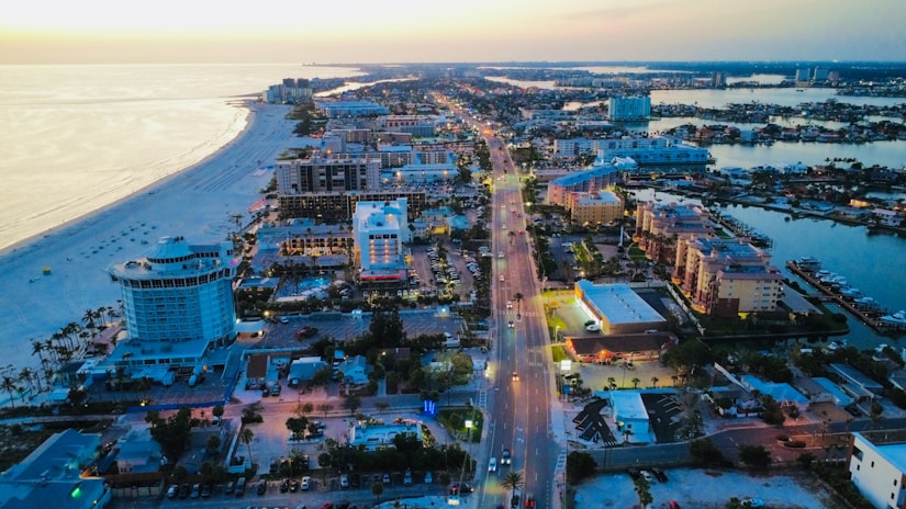 Aerial view of a coastal town at dusk.