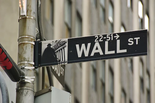 Wall Street street sign on a pole in New York City