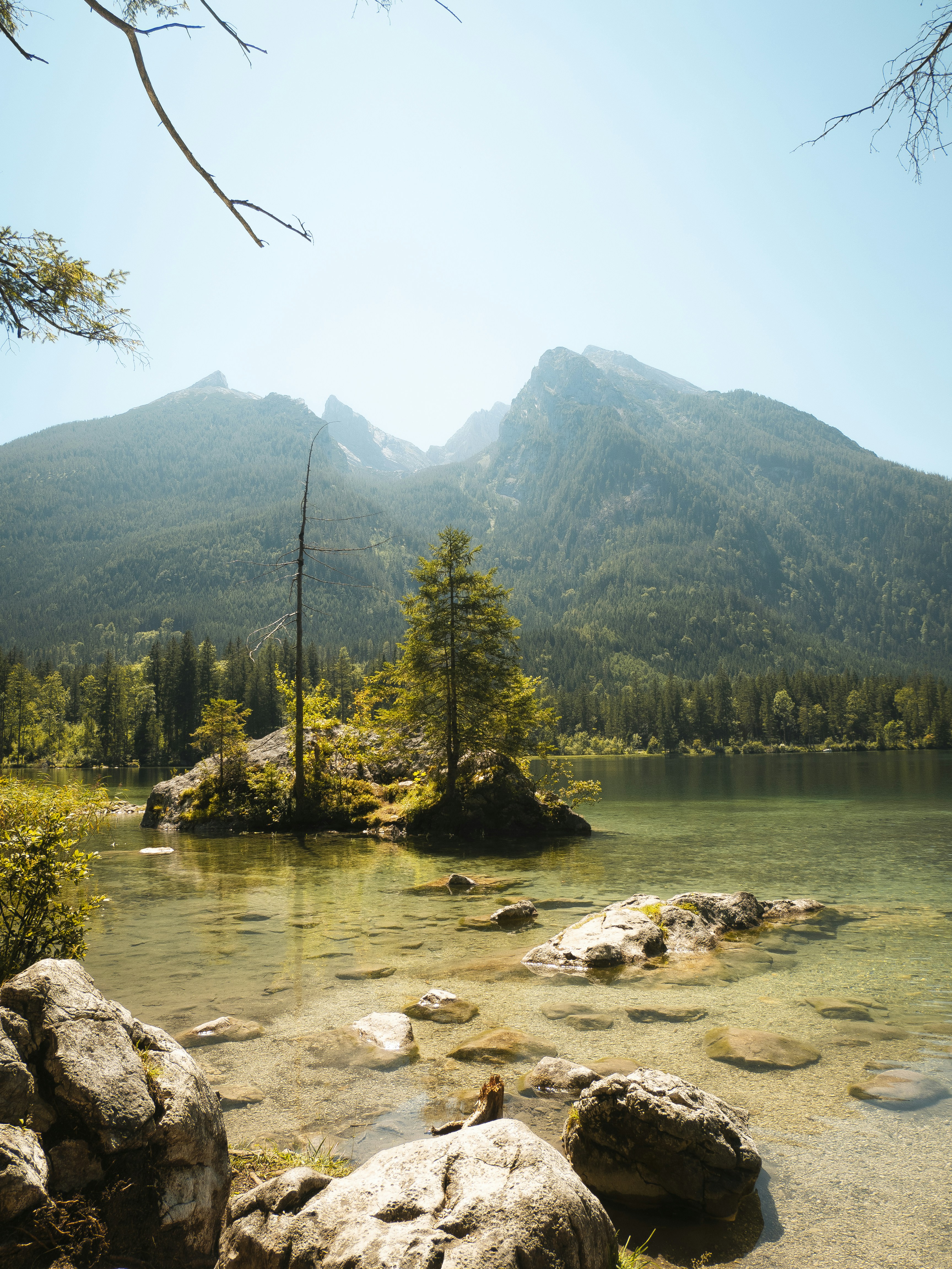 Mountains and a lake provide a scenic landscape.