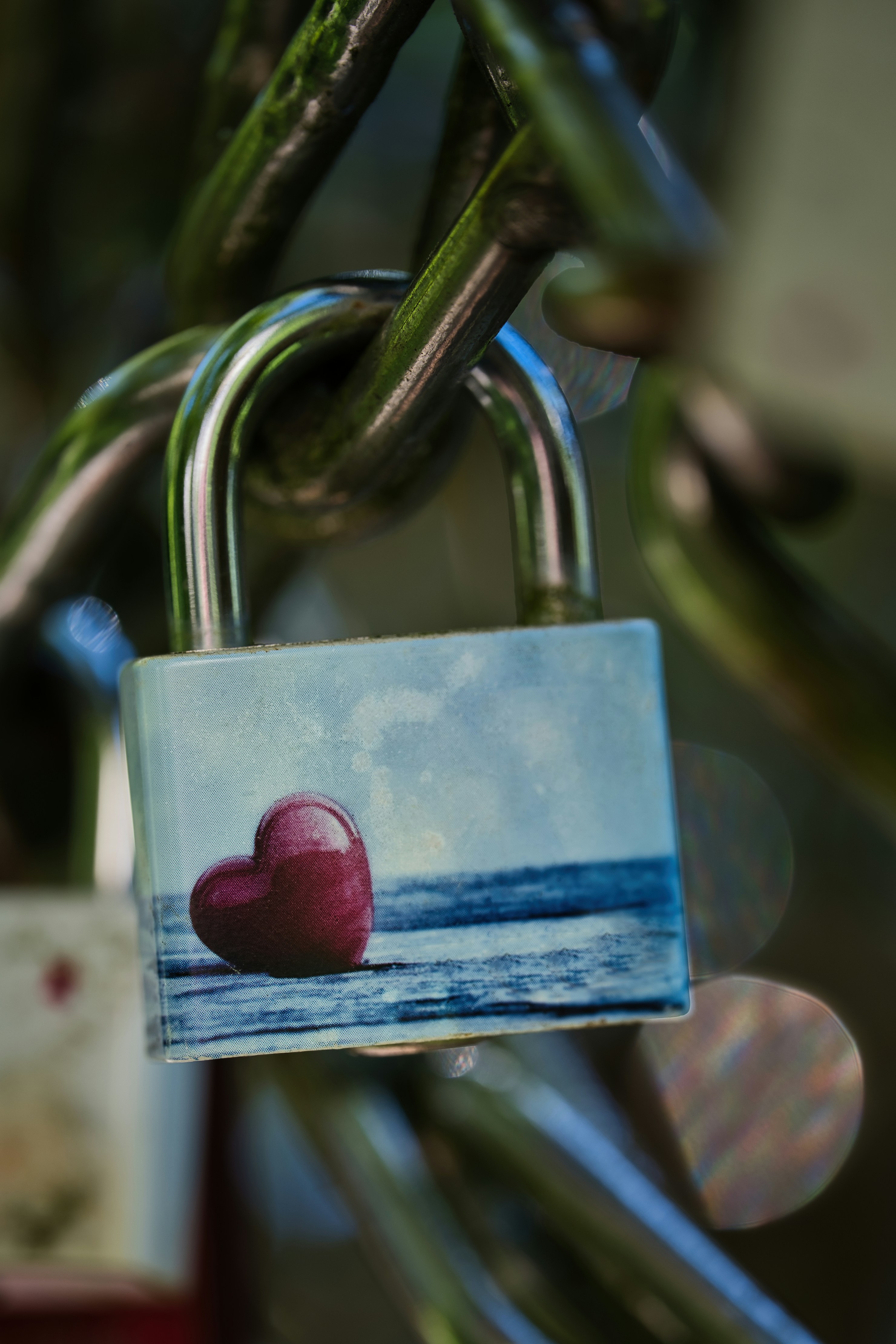A love lock adorned with a heart.