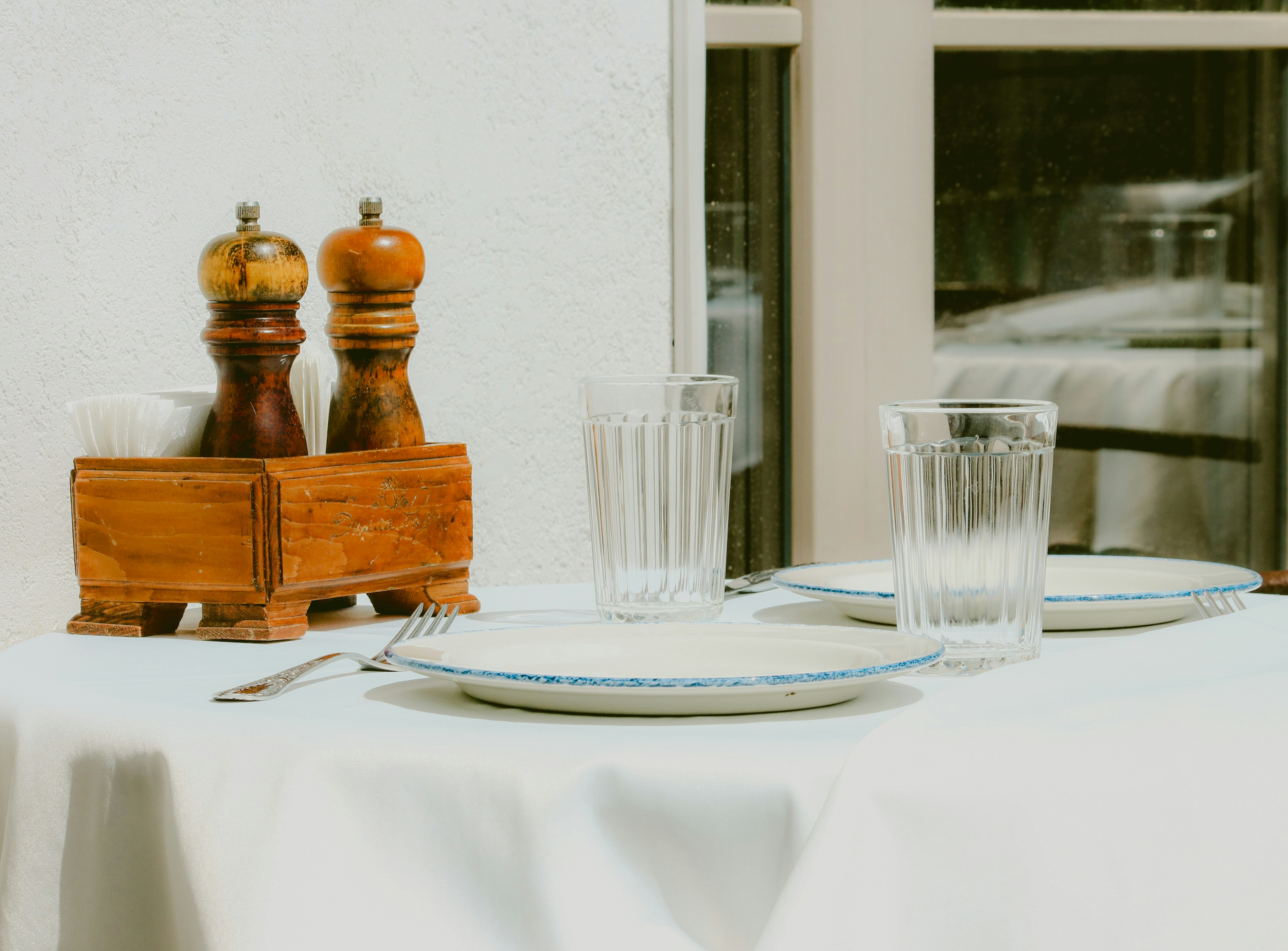 A rustic dining table set with traditional Swedish dishes