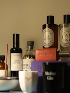 Luxurious fragrances and accessories are arranged.