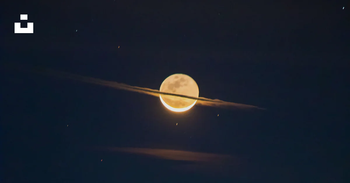 Moon Whit Rings Moon with rings and city lights. photo – Free Mountains Image on Unsplash