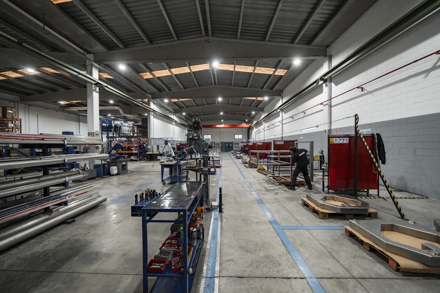Industrial facility interior with equipment and workers