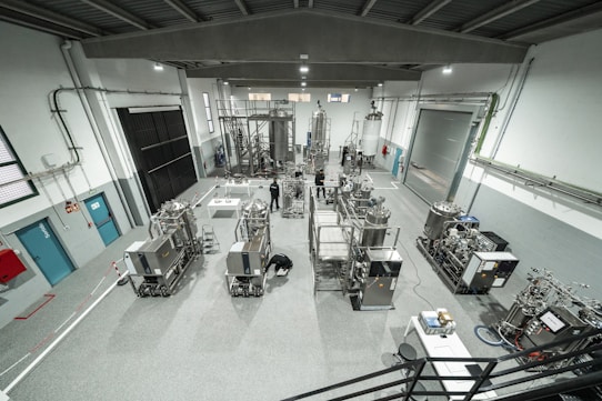 Inside a large industrial factory building.