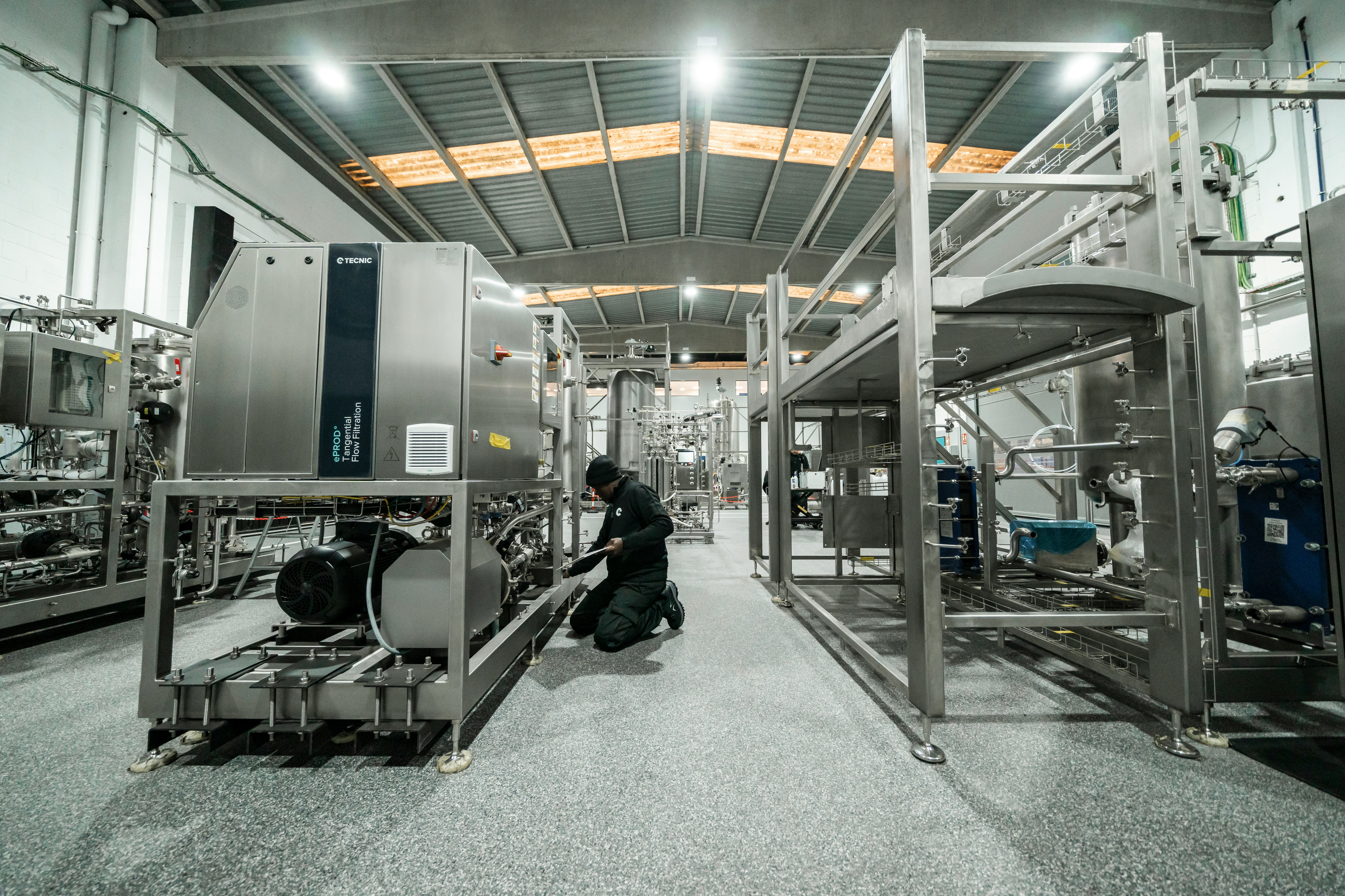 The Factory Floor as America: How Extract Turned a Bottling Plant Into the Most Honest Portrait of the Dream Gone Wrong