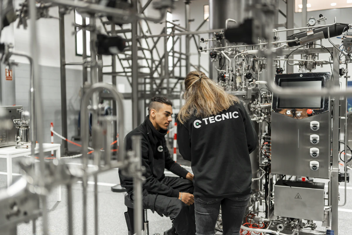 Bioreactor equipment in a technical validation environment — AI discovery tools must eventually connect to experimental and manufacturing reality.