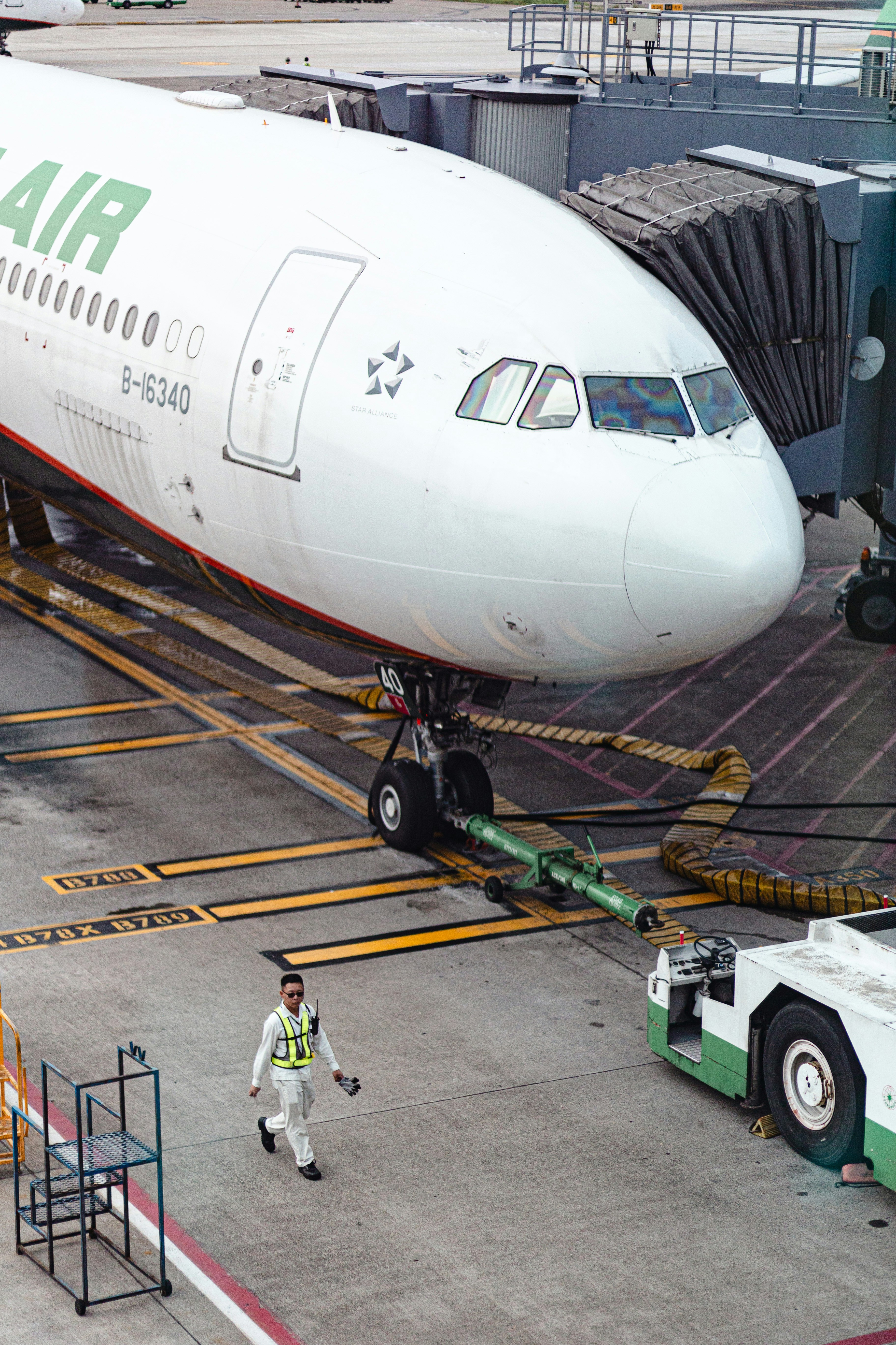Airplane at the airport being prepared for flight.