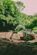 An excavator works at a construction site.
