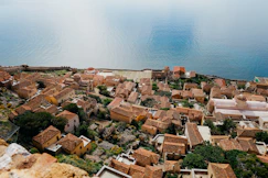 A coastal town sits next to the sea