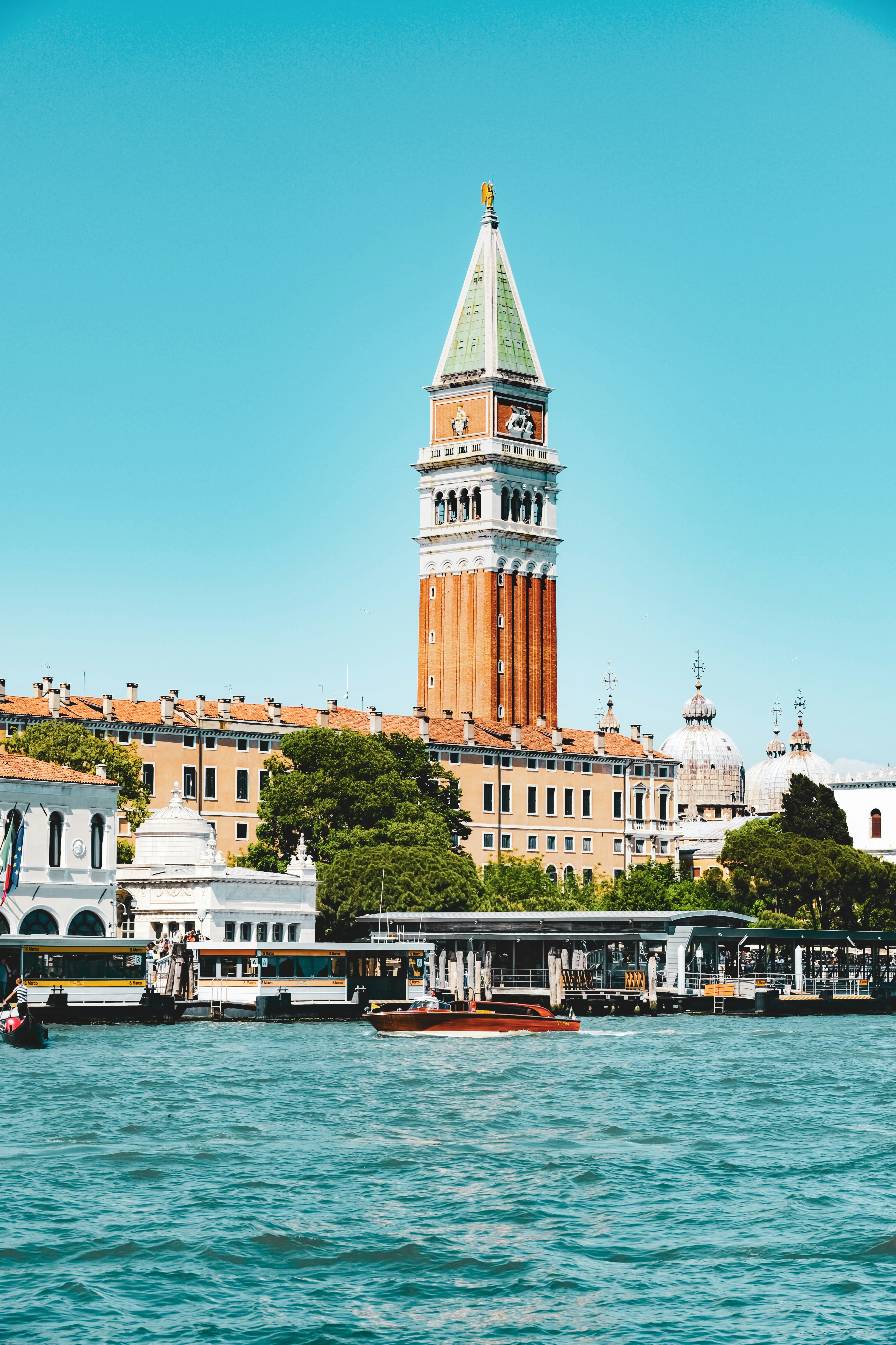Venice's iconic st mark's campanile tower looms.