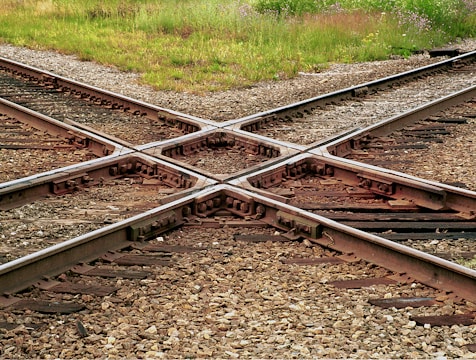 Railroad tracks cross each other.