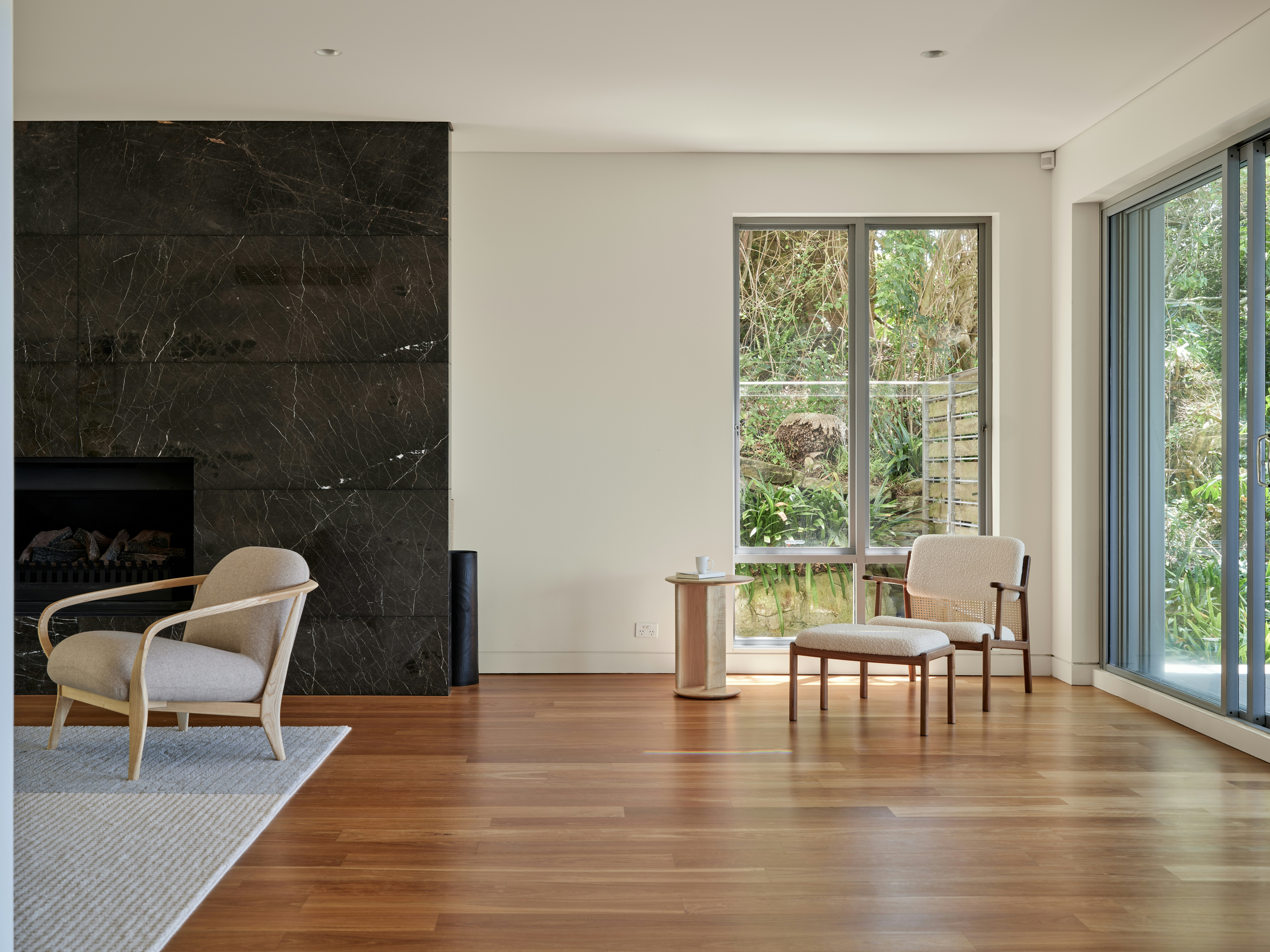 A modern living room with minimalist furniture.