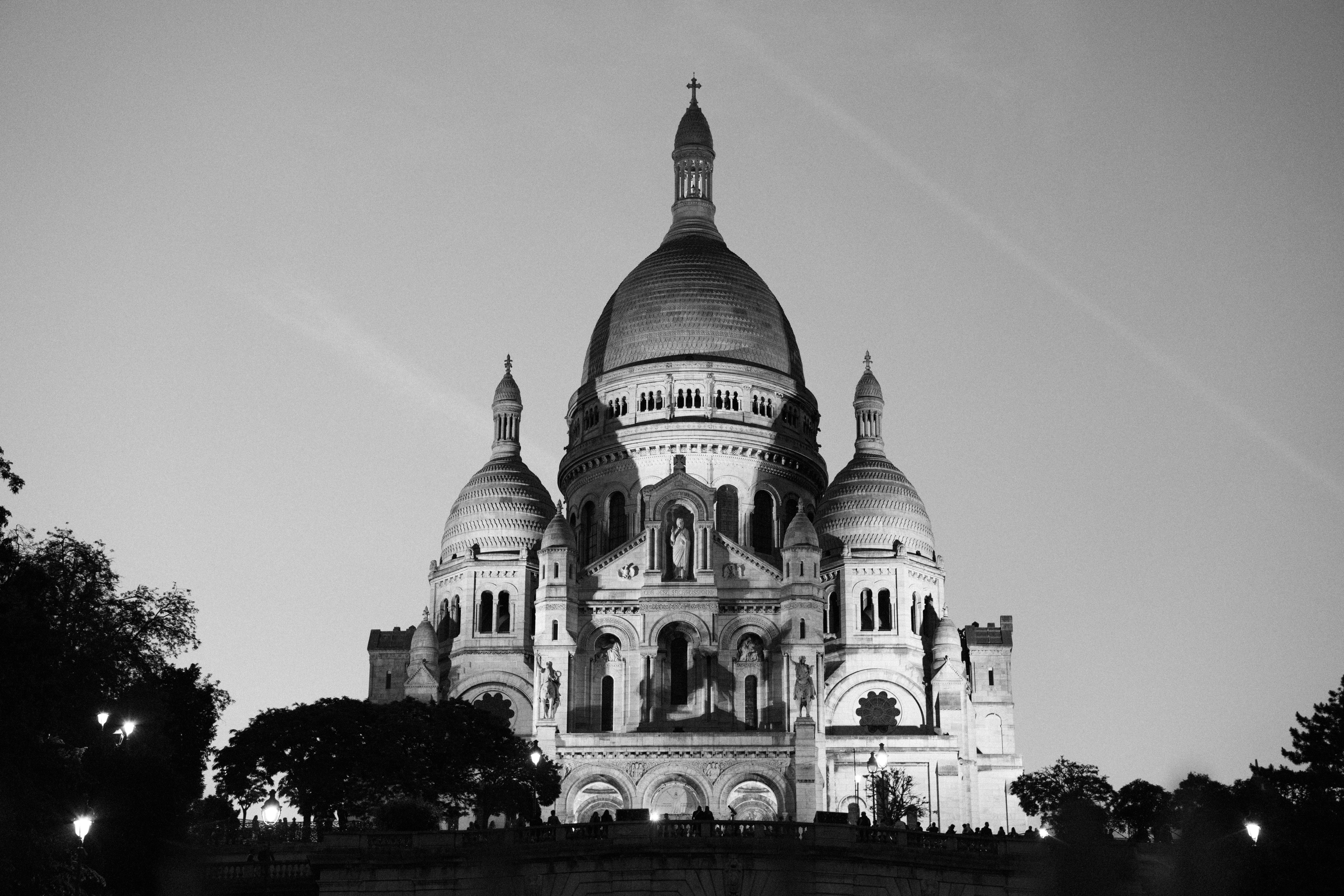 The basilica of sacré-cœur shines in paris.