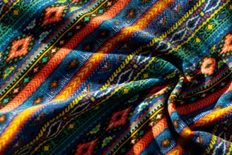Vibrant fabric with a colorful, intricate pattern.