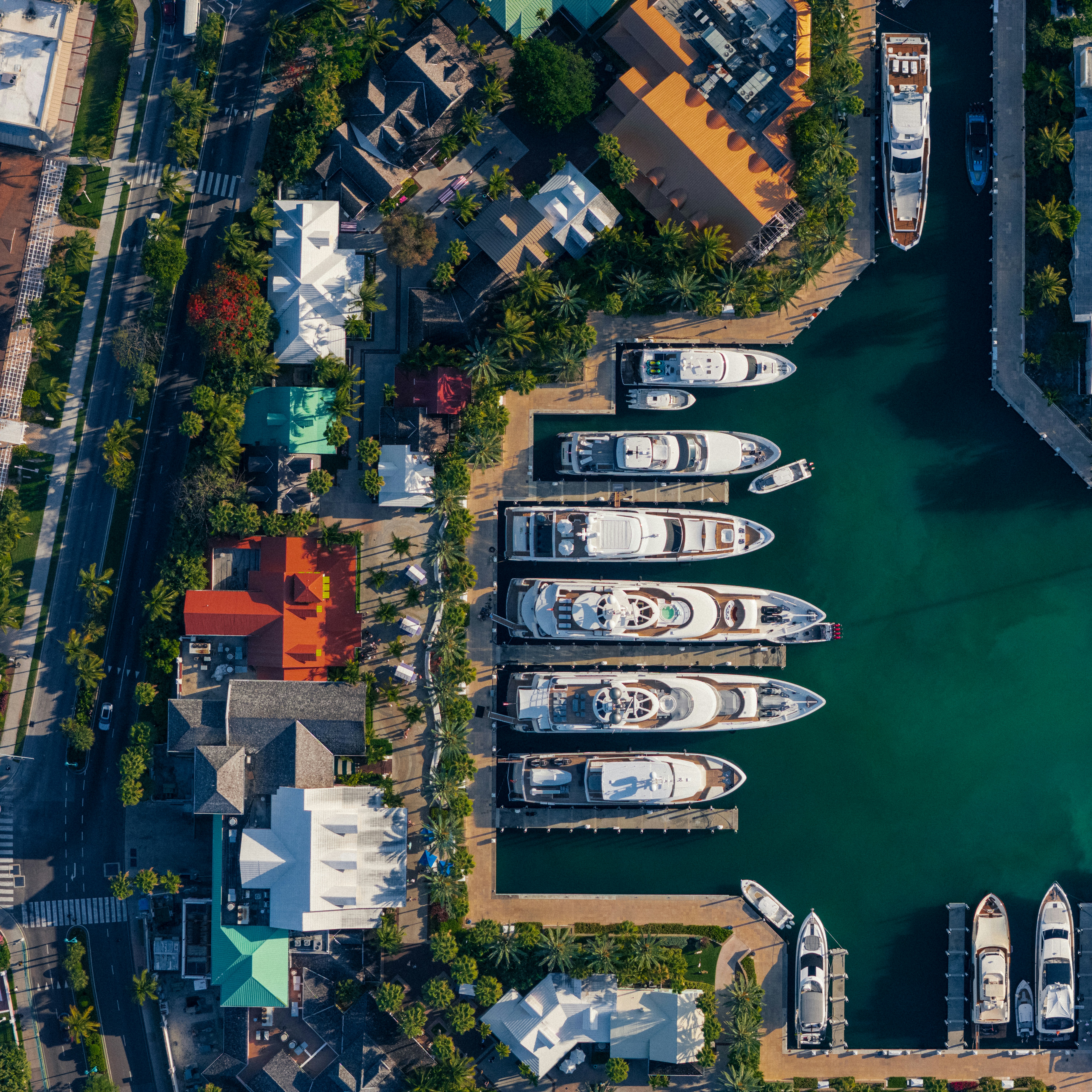An aerial view shows docked yachts in a harbor. photo – Free Bahamas ...
